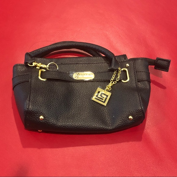 lori grenier Handbags - Lori Grenier black cellphone mini bag - new lori grenier Handbags - Lori Grenier black cellphone mini bag - new